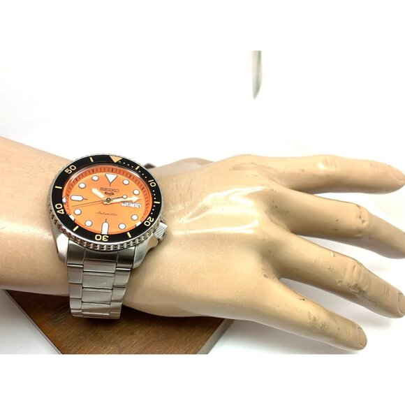Seiko 5 Men's Watch SRPD59 Automatic Orange Dial Day Date Silver Stainless Steel - Picture 5 of 15